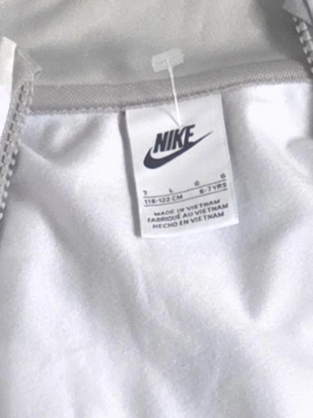 Nike Women's Gray Camo Bomber Jacket with Neon Yellow Logo